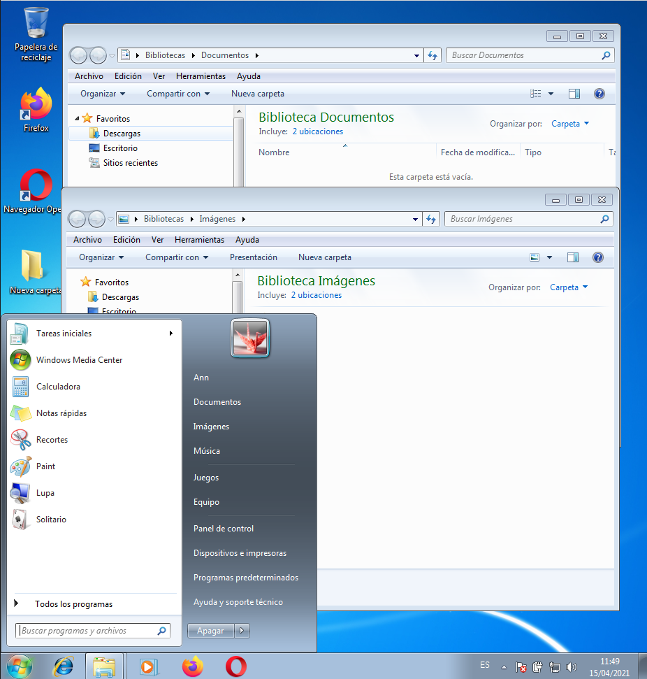 Menú de windows 7 amb explorador d'arxius obert al darrere